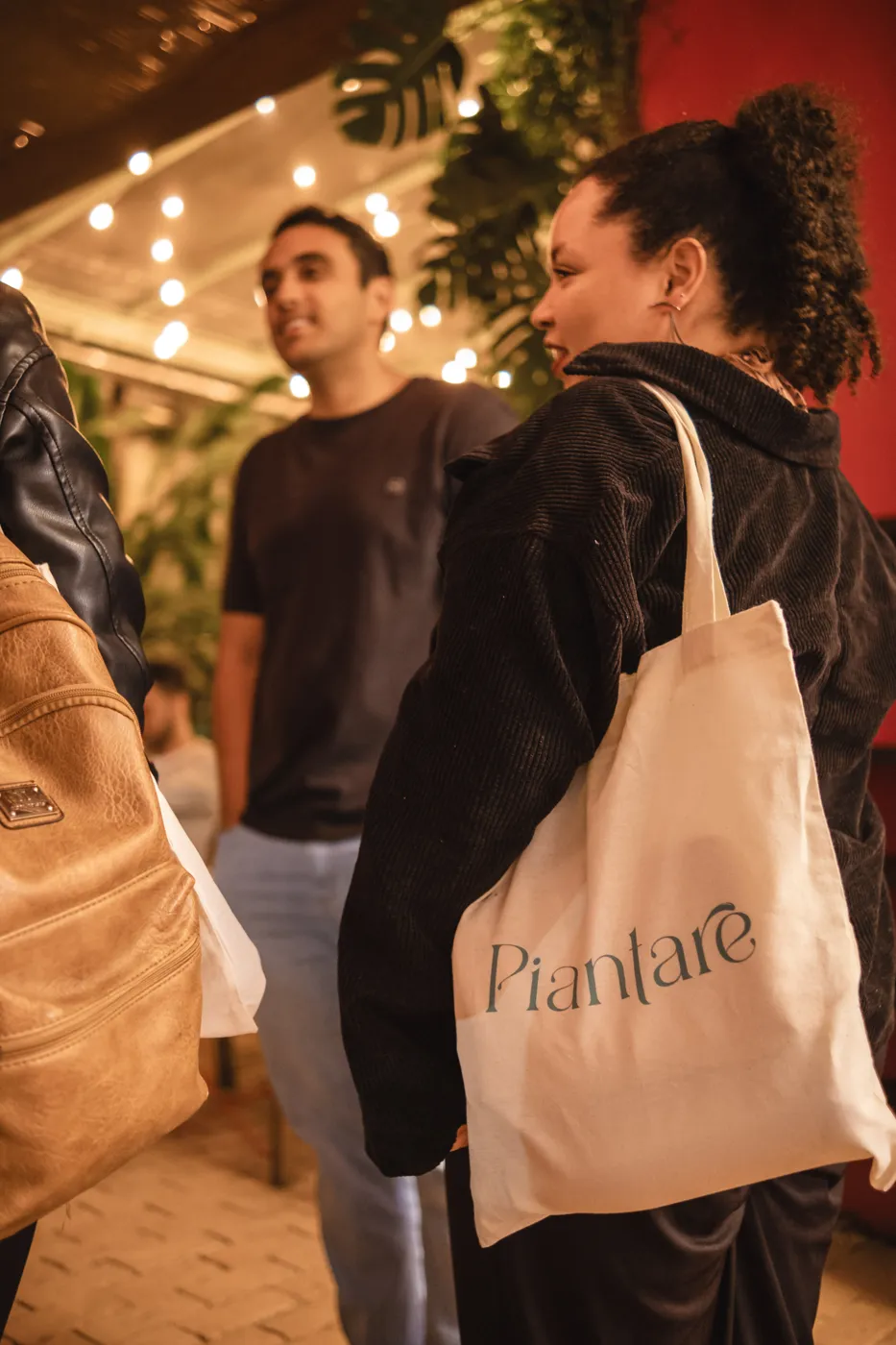 Participante com a ecobag Piantare em um dos nossos encontros
